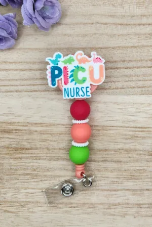 Badge Reel-PICU Nurse Dinosaurs NP021